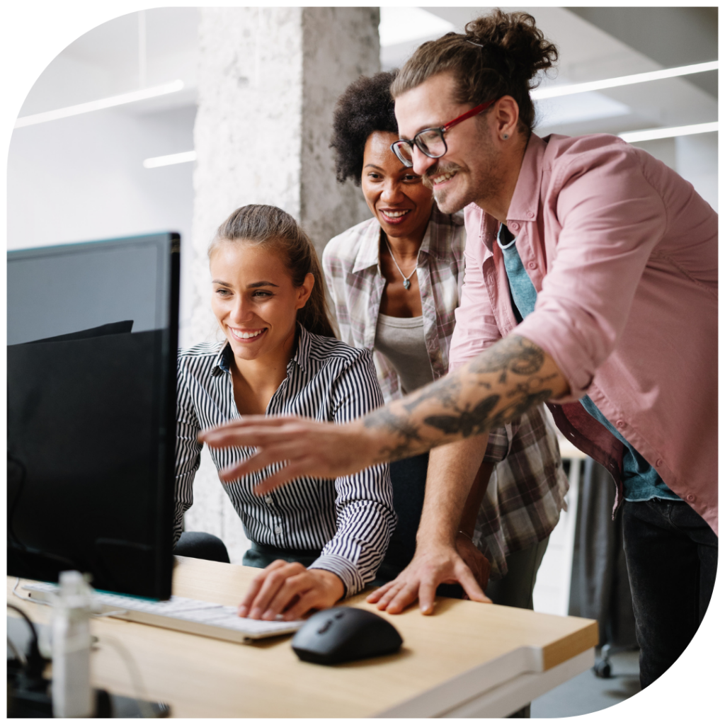 three-coworkers-looking-at-the-same-computer-screen