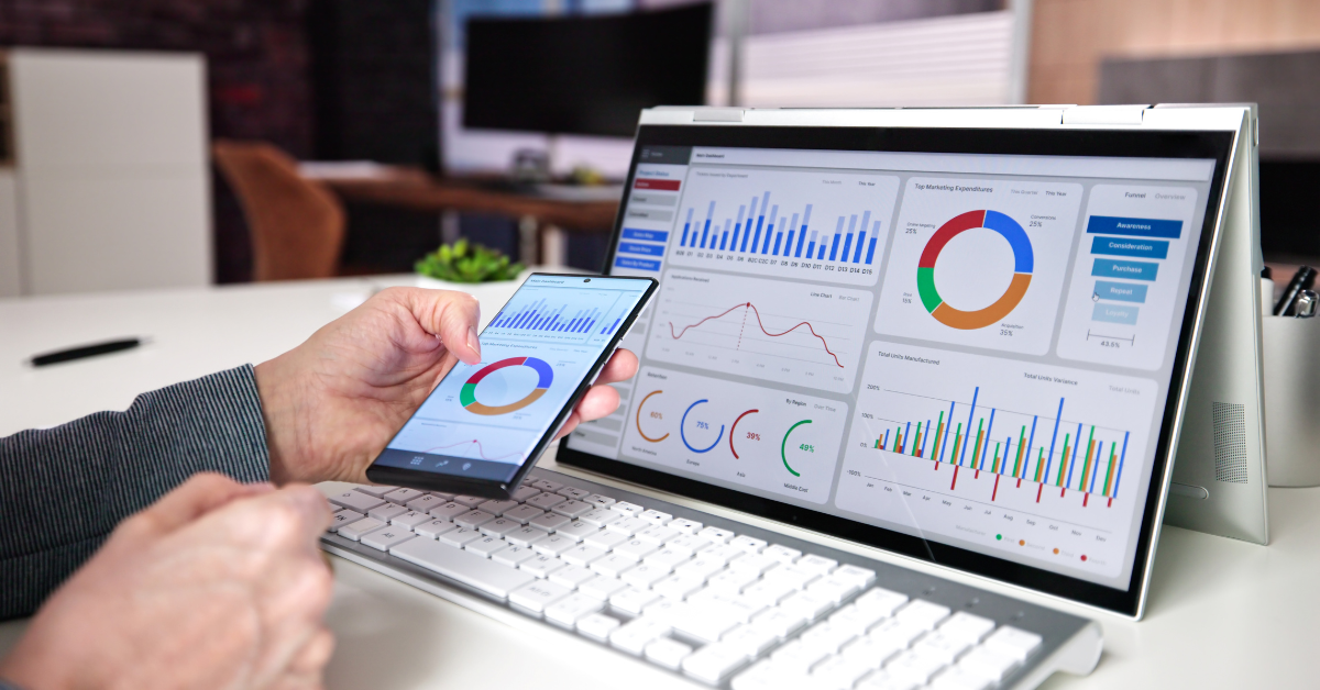 Phone and computer displaying dashboard